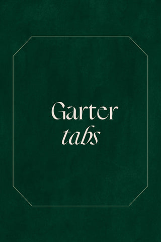 A branded The Bad Button graphic says garter tabs