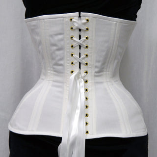 A Bad Button bespoke corset design by Alisha Martin in the form of a white historical corset