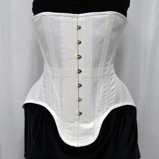 A Bad Button bespoke corset design by Alisha Martin in the form of a white historical corset