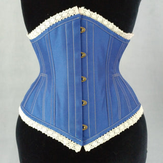 A Bad Button bespoke corset design by Alisha Martin featuring a blue base, contrast stitching and lace edge detailing