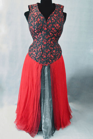 A Bad Button bespoke corset design by Alisha Martin featuring a red and black corset top and red skirt