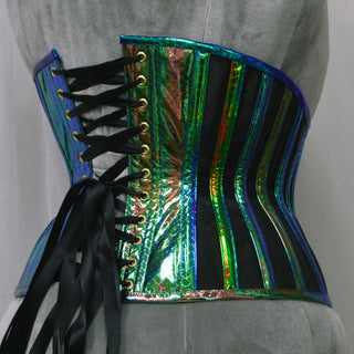 A Bad Button custom corset design by Alisha Martin featuring black panelling and a rainbow iridescent scale material  scale