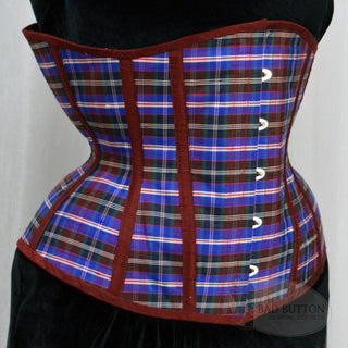 A Bad Button custom corset design by Alisha Martin featuring a blue and red plaid